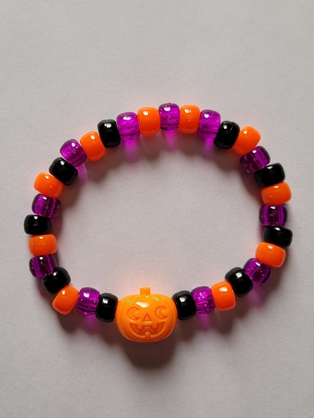 Halloween Jack o' Lantern Bead Bracelet Purple, Black, and Orange Beads
